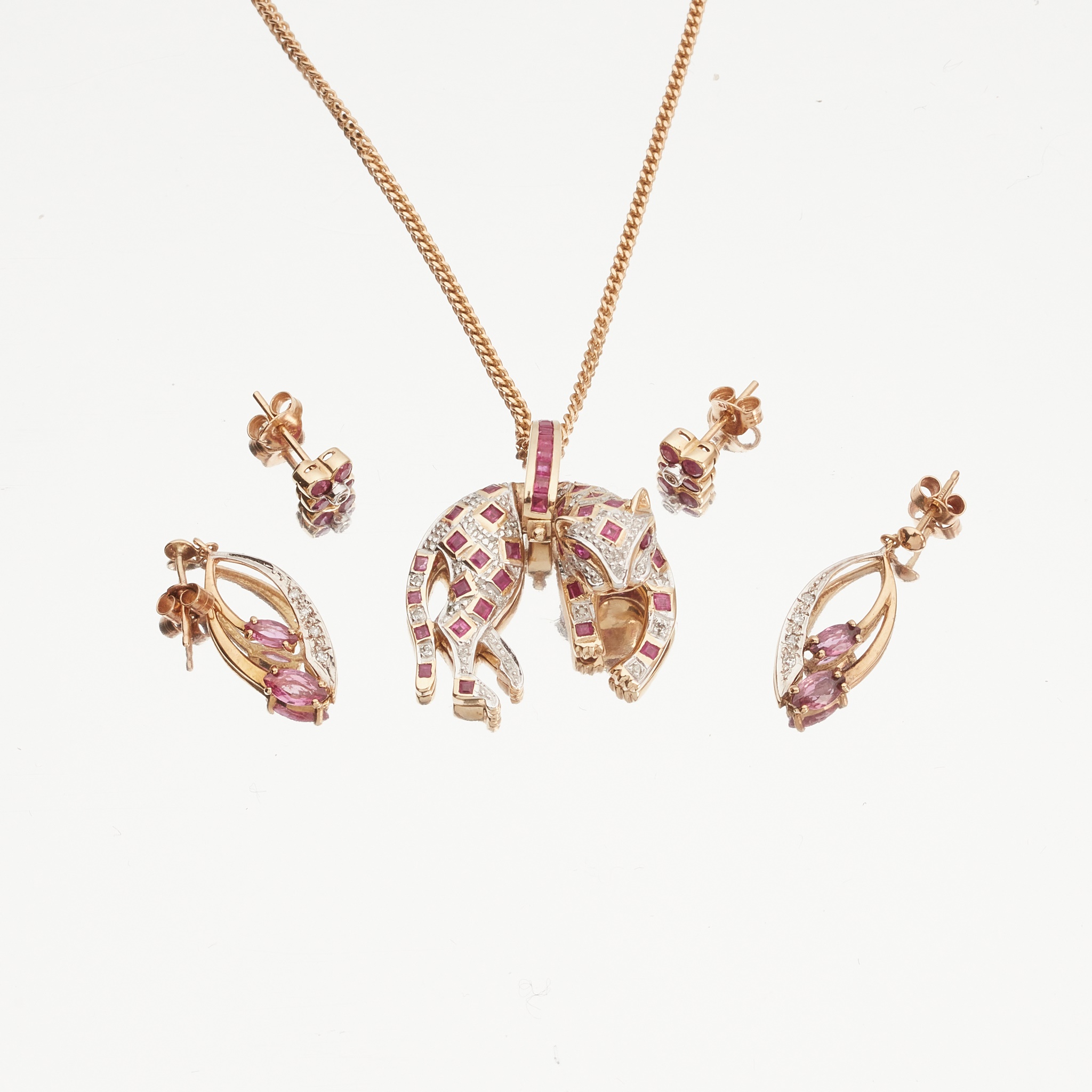 A ruby and diamond set pendant