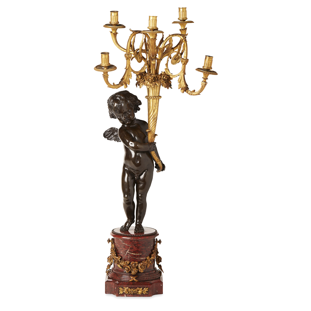 FINE AND LARGE FRENCH GILT AND PATINATED BRONZE AND ROUGE MARBLE FIGURAL CANDELABRA IN THE MANNER OF HENRY DASSON