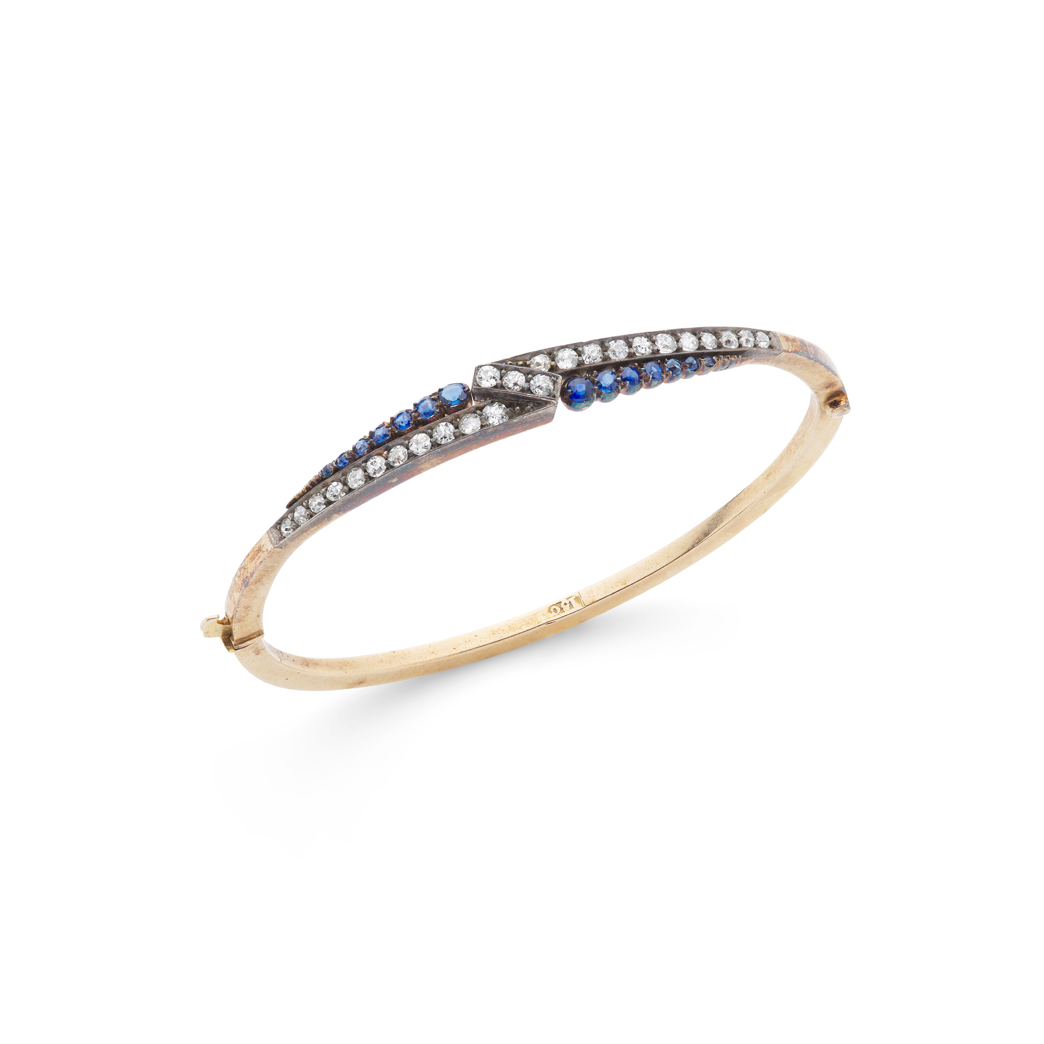 A late 20th century sapphire and diamond bangle