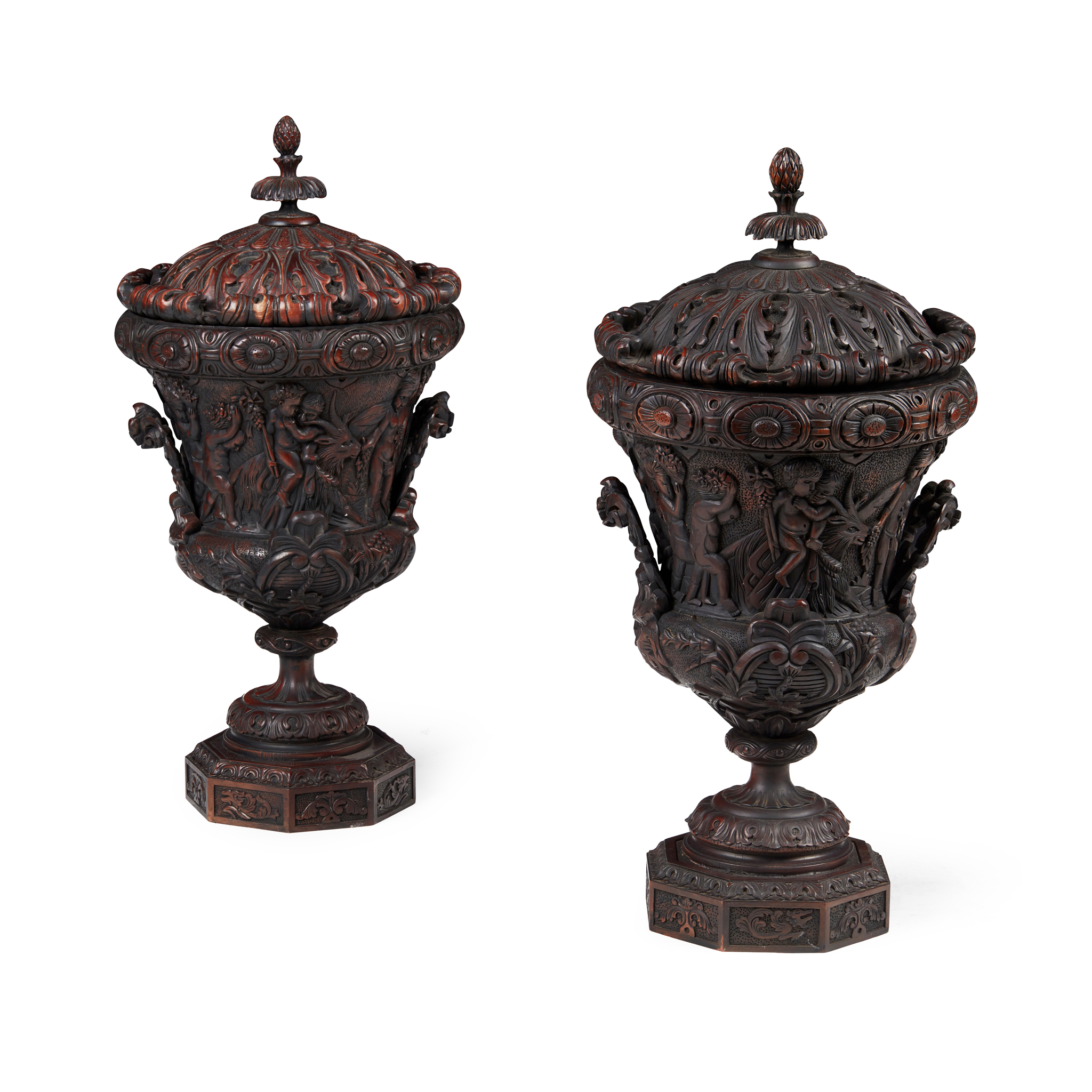 PAIR OF CARVED MAHOGANY URNS AND COVERS