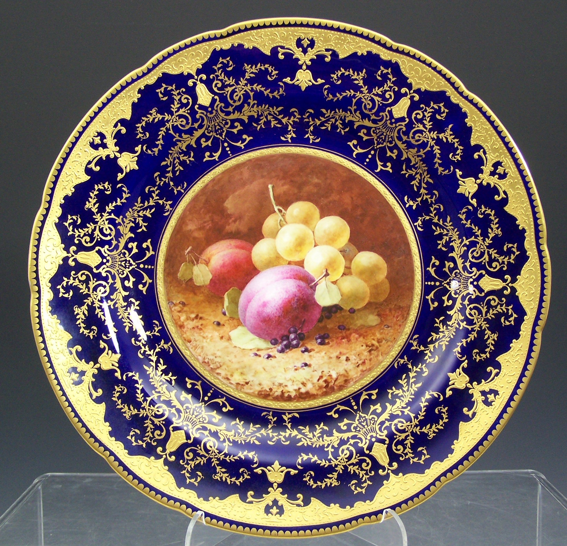 A large early 20th century Coalport plate,