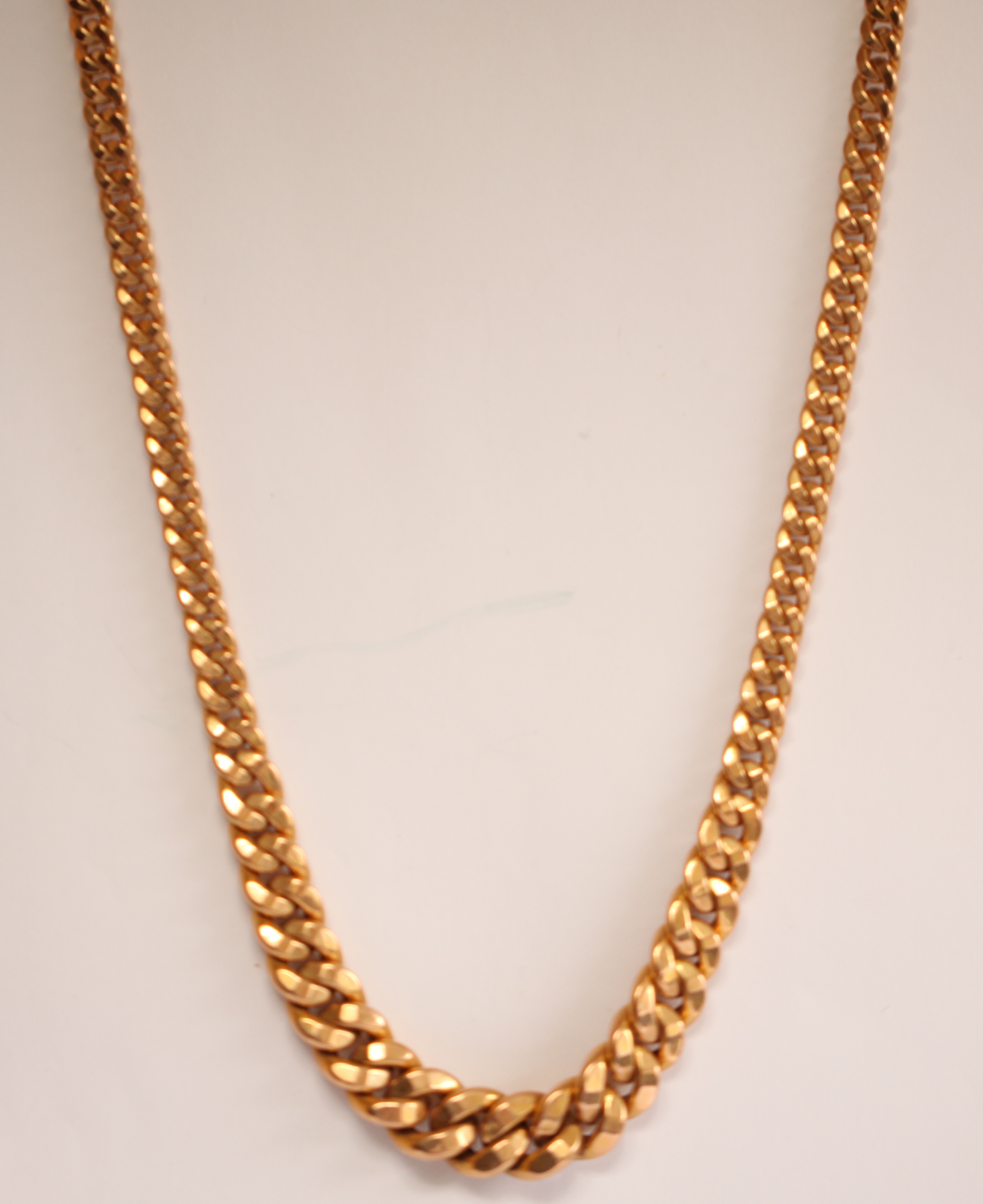 A large gold neck chain