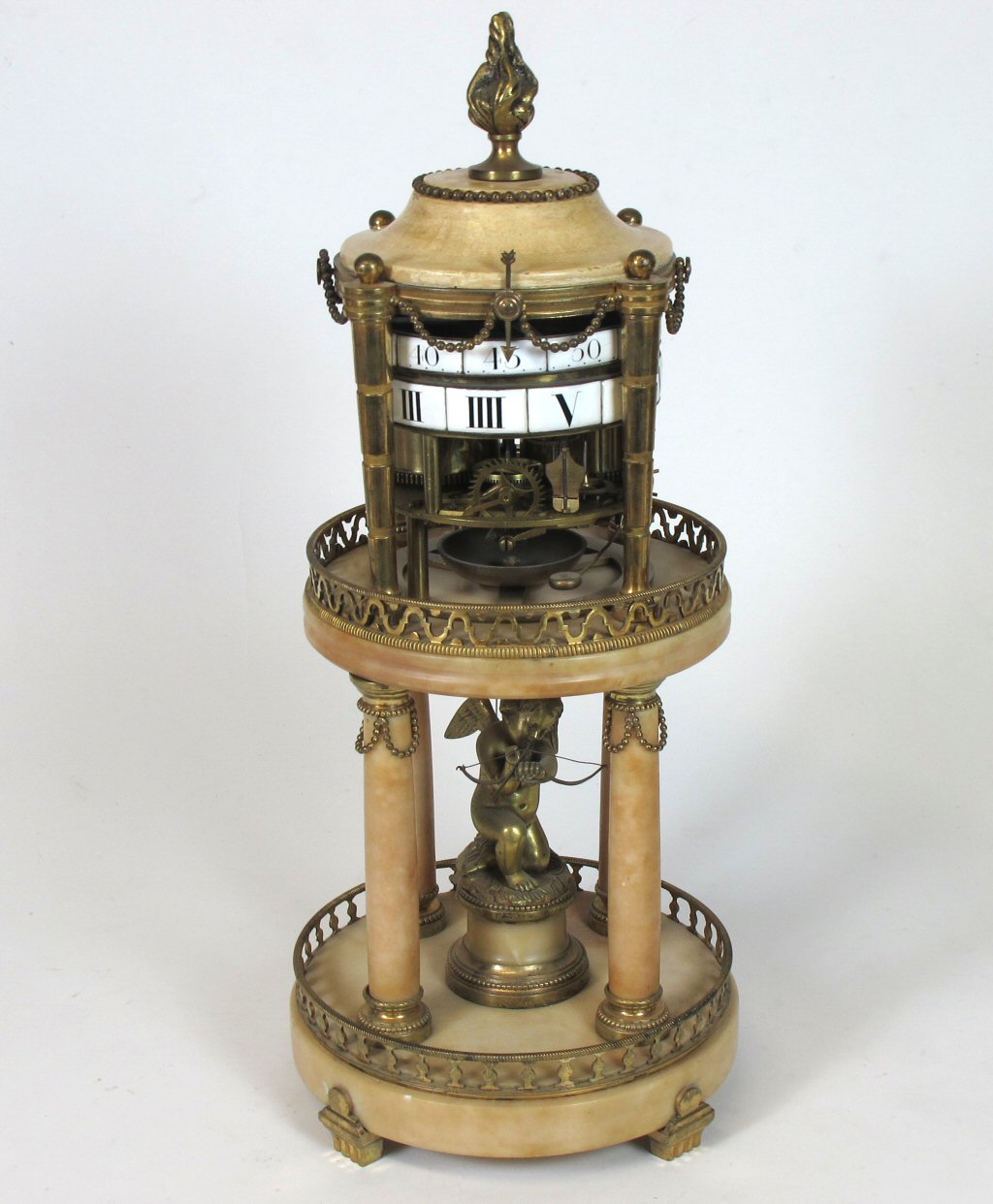 FRENCH ALABASTER AND GILT METAL MOUNTED CERCLES TOURNANTS CLOCK