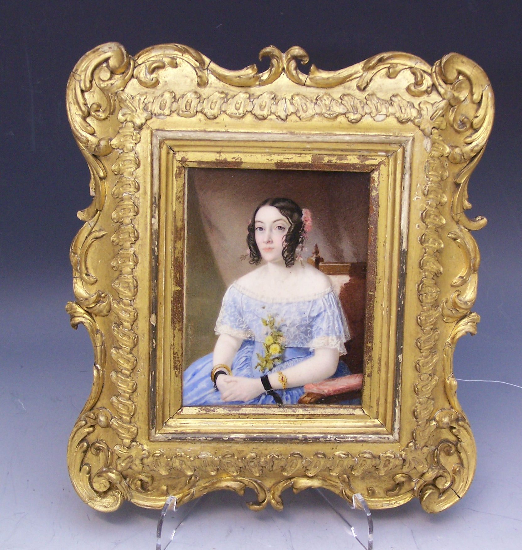 Chester Earles A portrait miniature of a young lady,