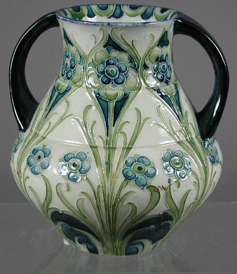 A Moorcroft Florian ware twin handled vase