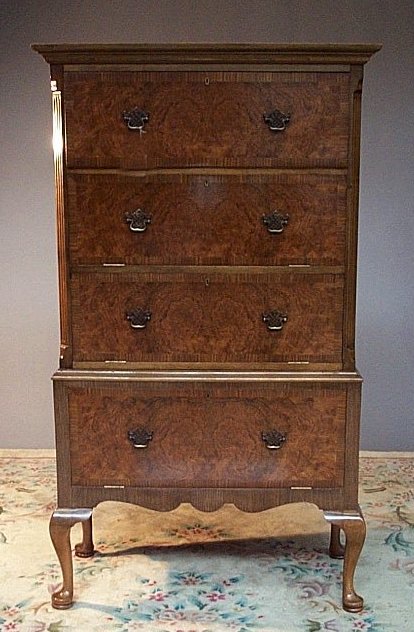 A walnut chest on stand