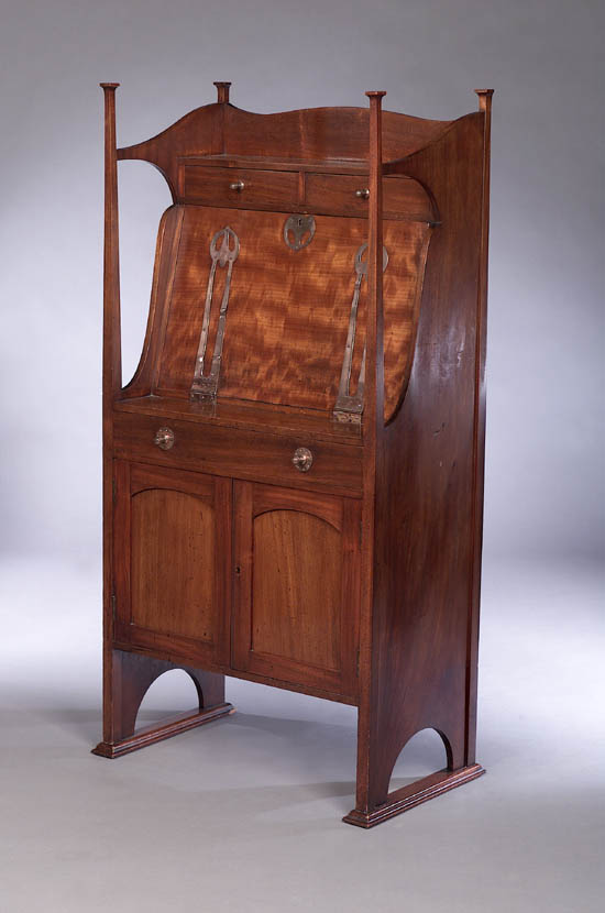 An Art Nouveau satin mahogany fall front desk