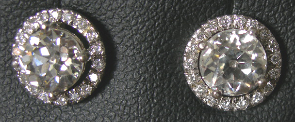 A pair of diamond cluster earrings,
