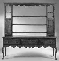 A Georgian oak and mahogany crossbanded dresser