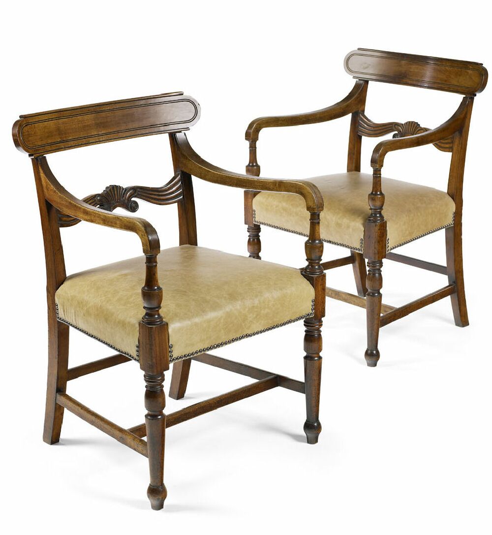 A set of four Regency mahogany open armchairs