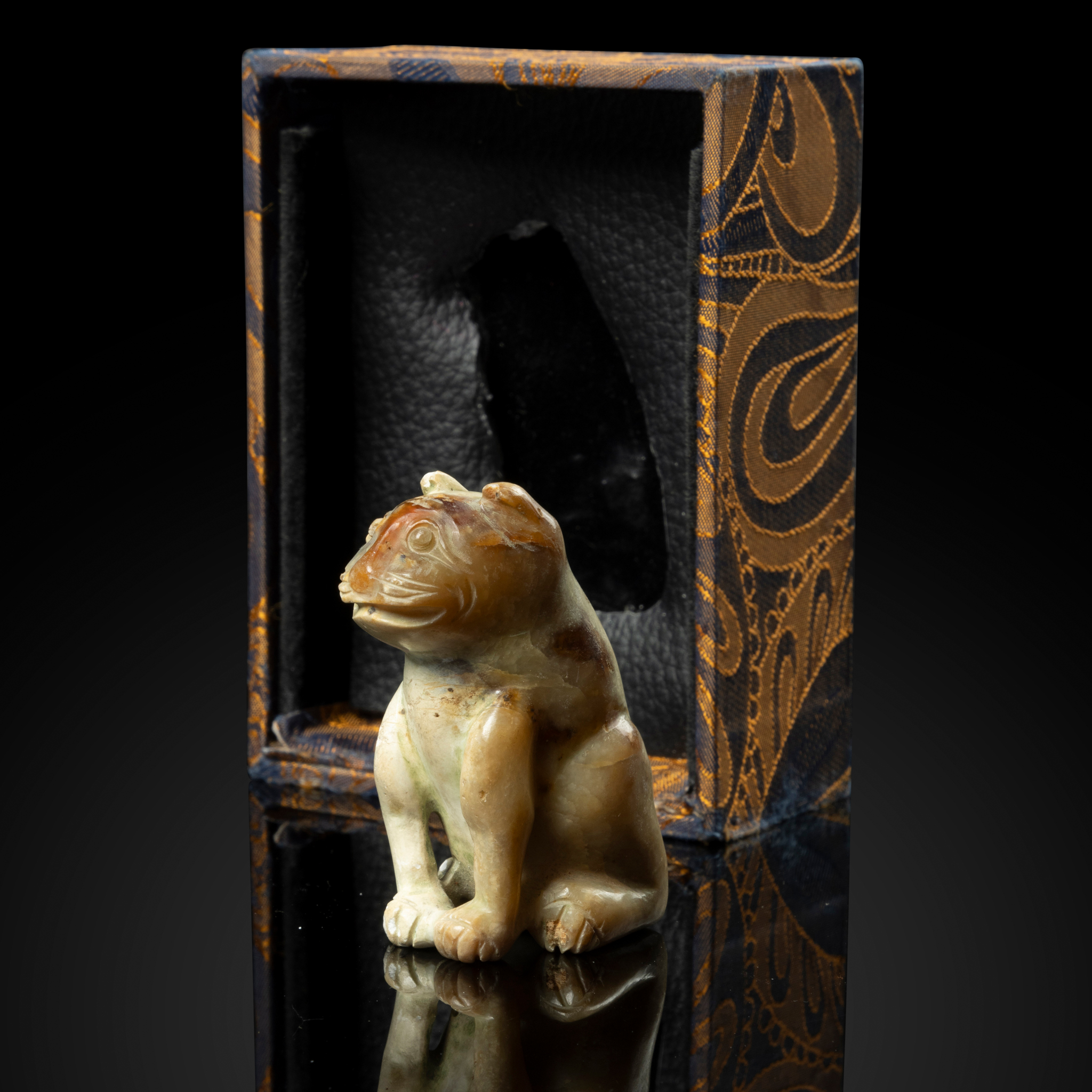 RTO- CHINESE CELADON JADE CARVING OF A SEATED TIGER