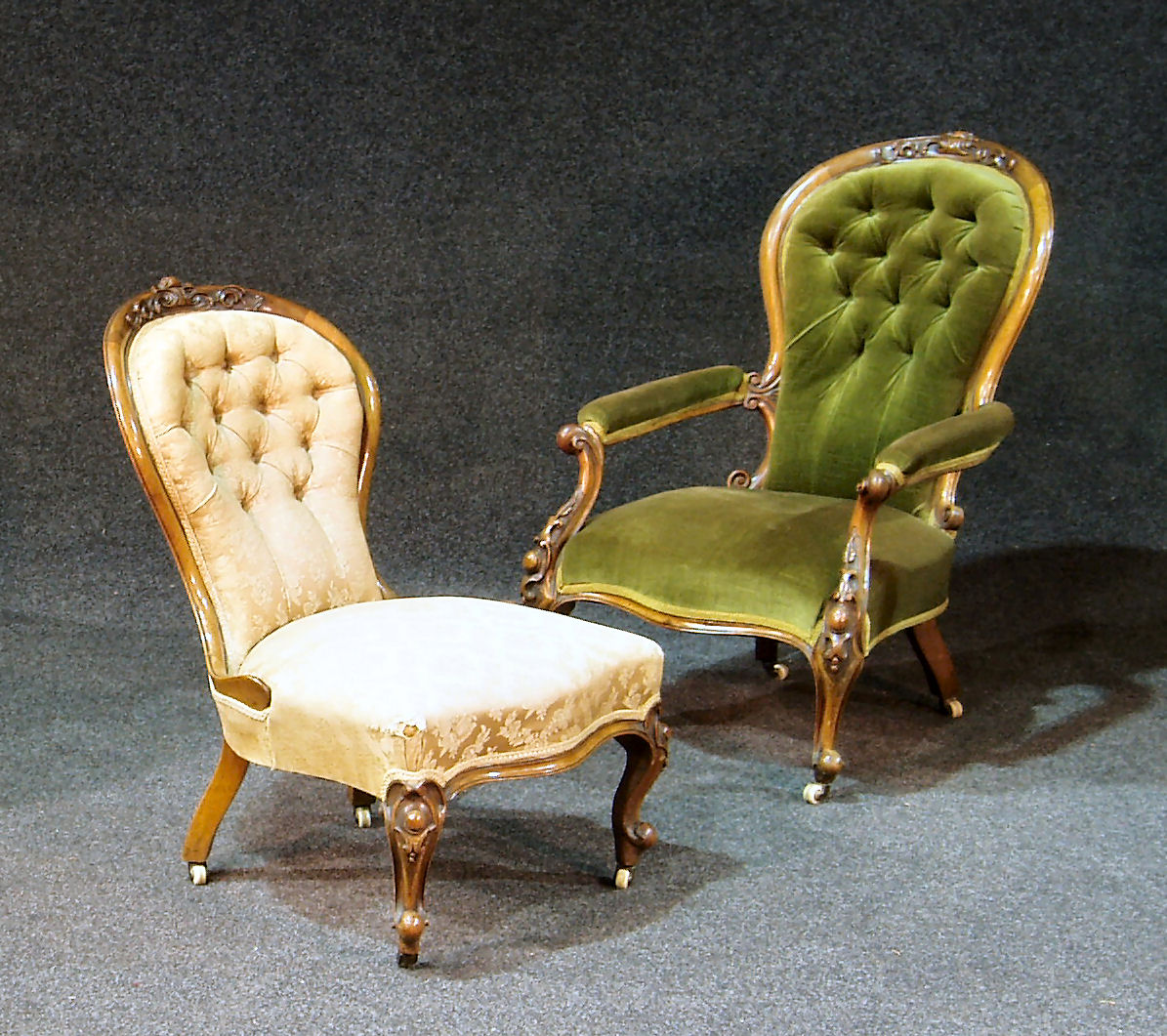 A pair of Victorian Lady's and Gentleman's walnut parlour chairs