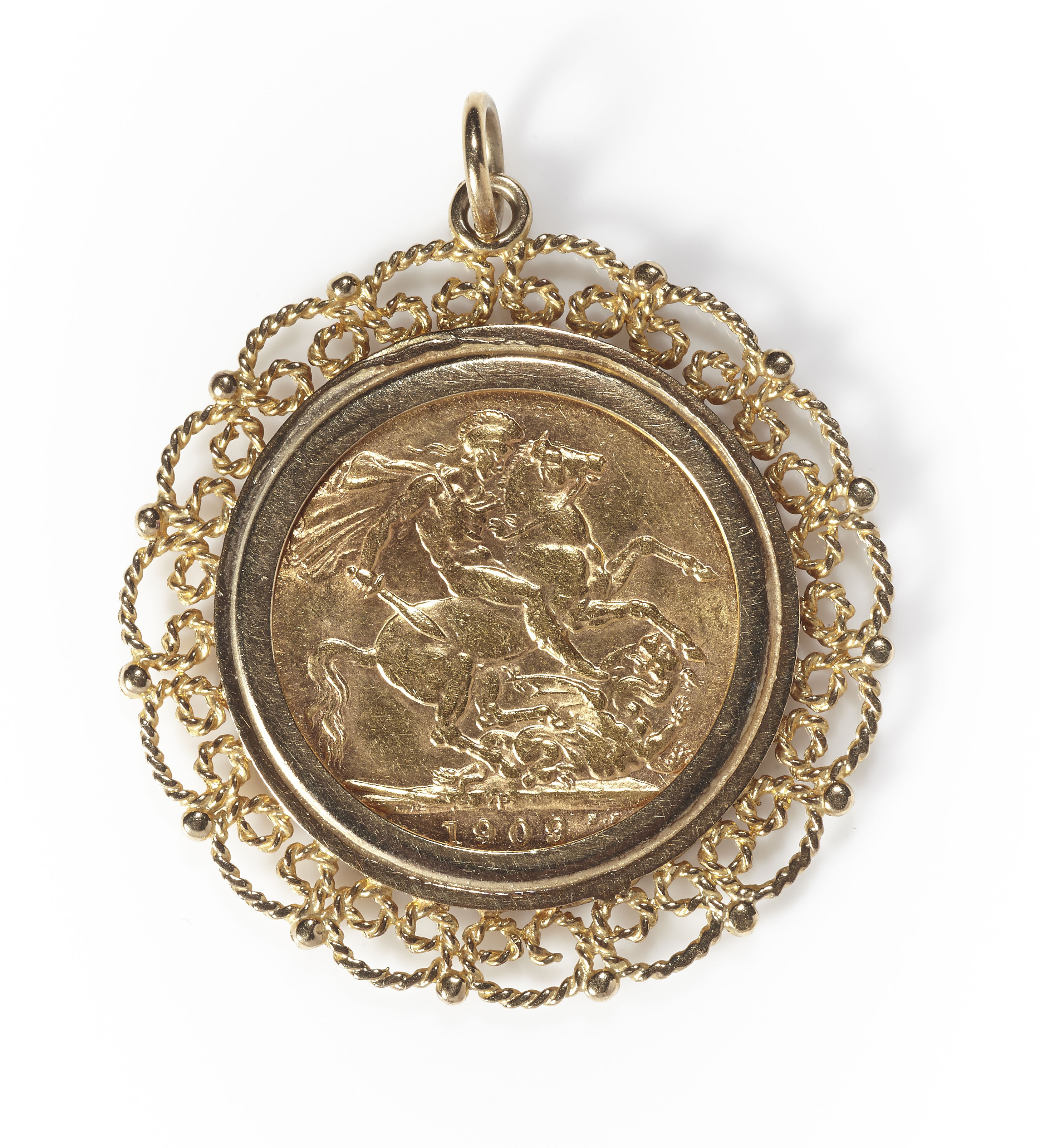 A 9ct gold pendant mounted Edward VII sovereign dated 1909