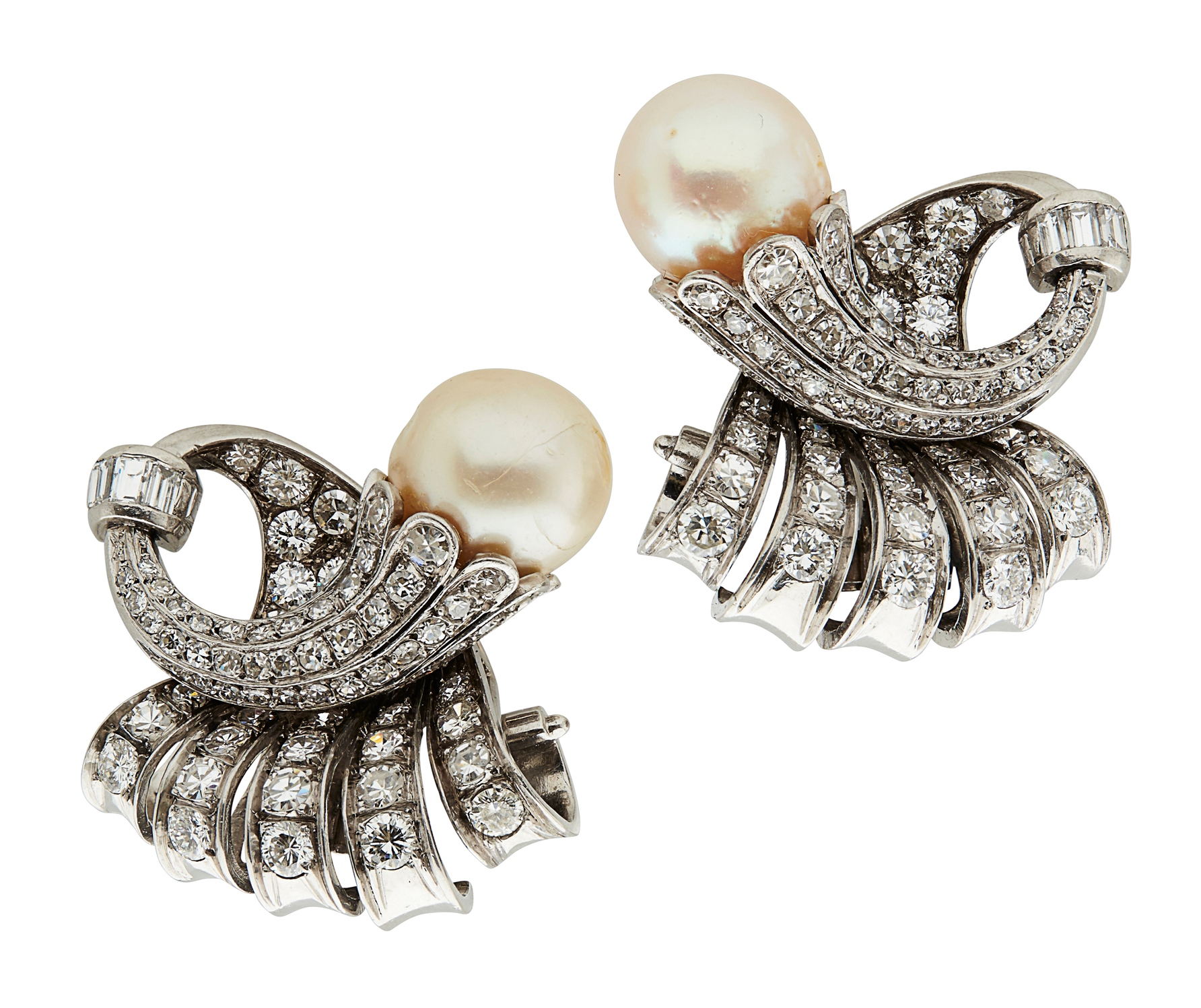 A pair of 1930s pearl and diamond set clip earrings