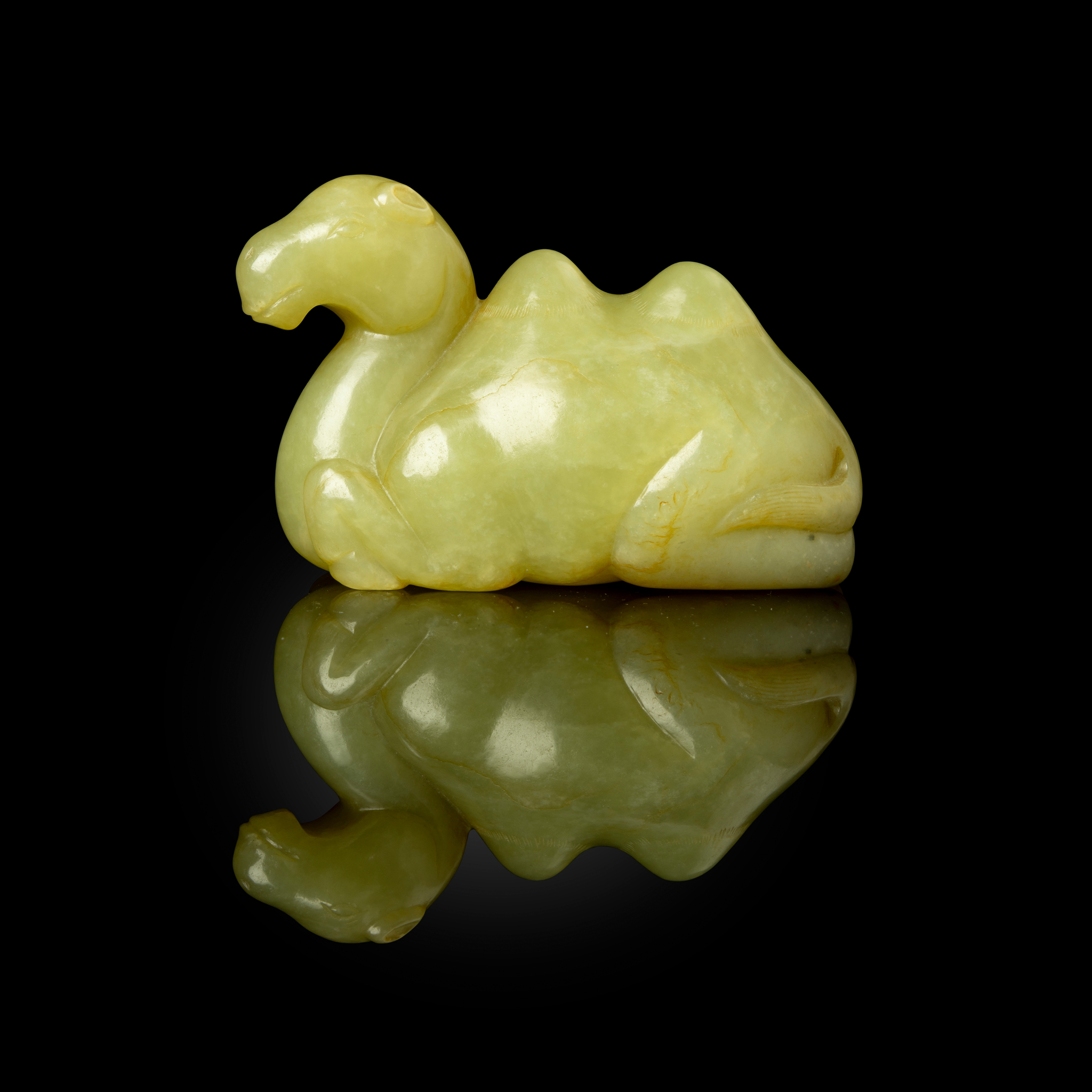 CHINESE CARVED YELLOW JADE 'CAMEL' BRUSH REST