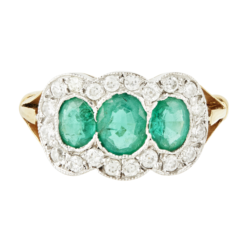 An emerald and diamond triple cluster ring
