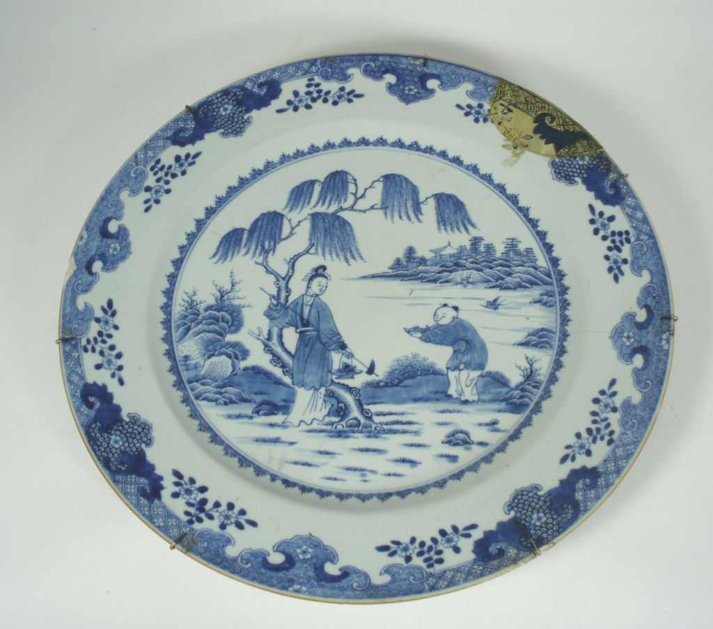 A large 18th century Chinese blue painted charger