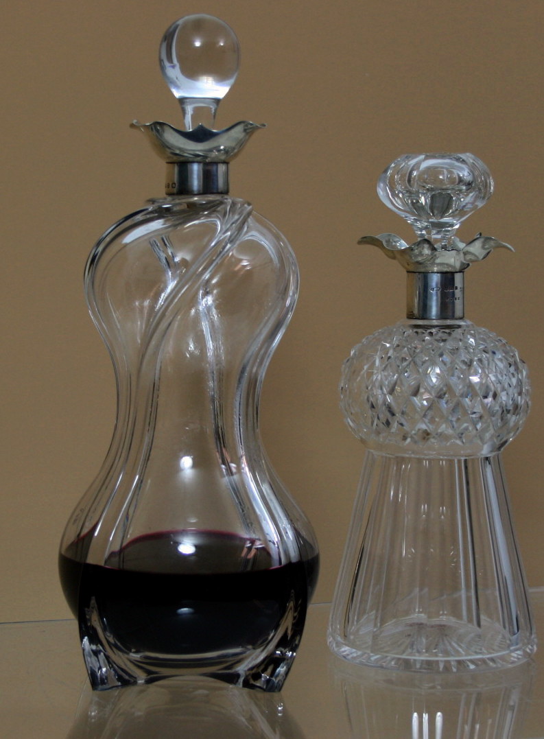 A silver mounted wine decanter
