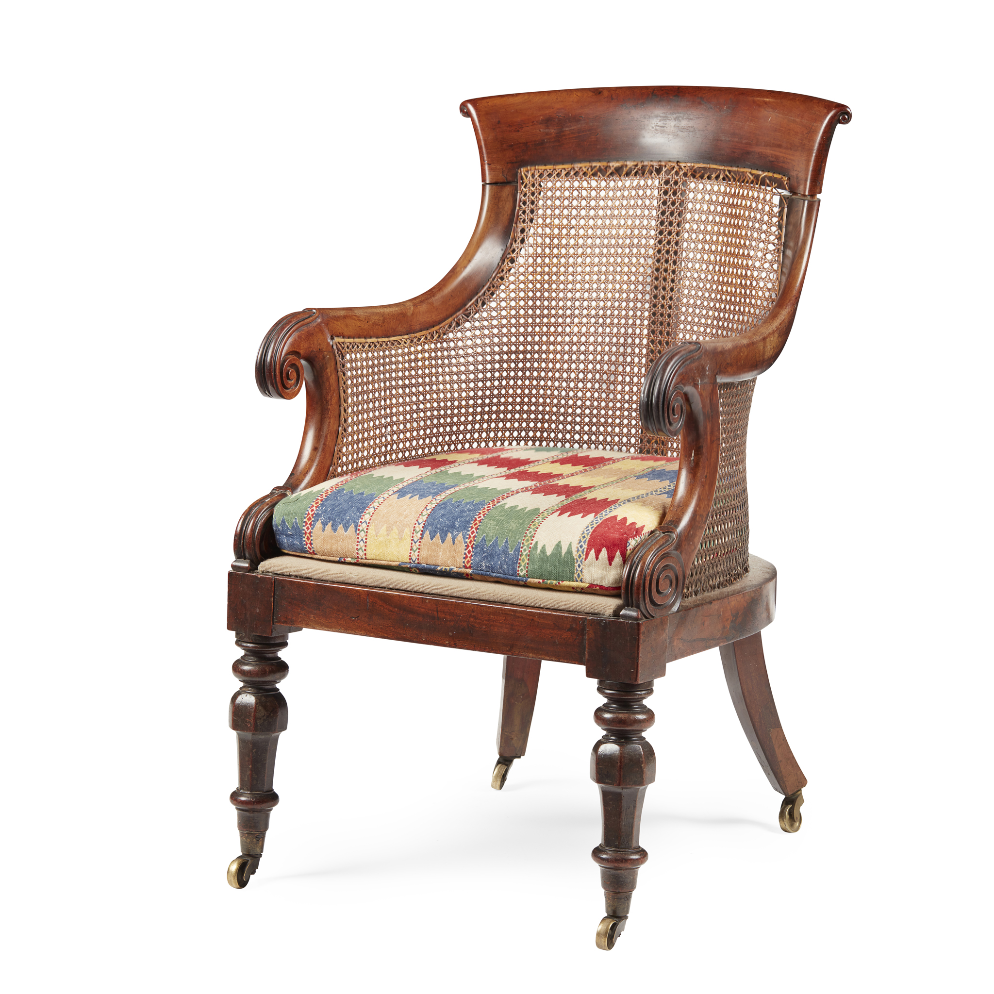REGENCY MAHOGANY BERGERE LIBRARY ARMCHAIR