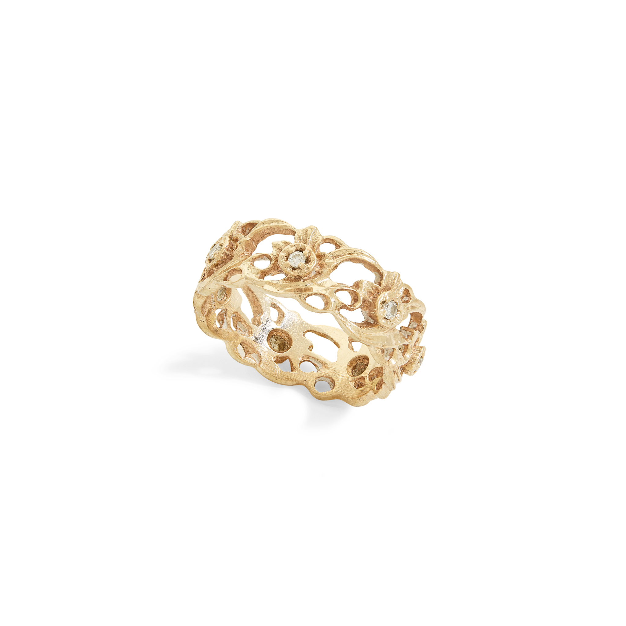 A 14ct gold floral pattern diamond eternity ring