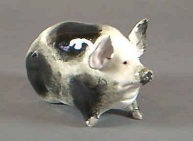 A Wemyss model of a seated pig