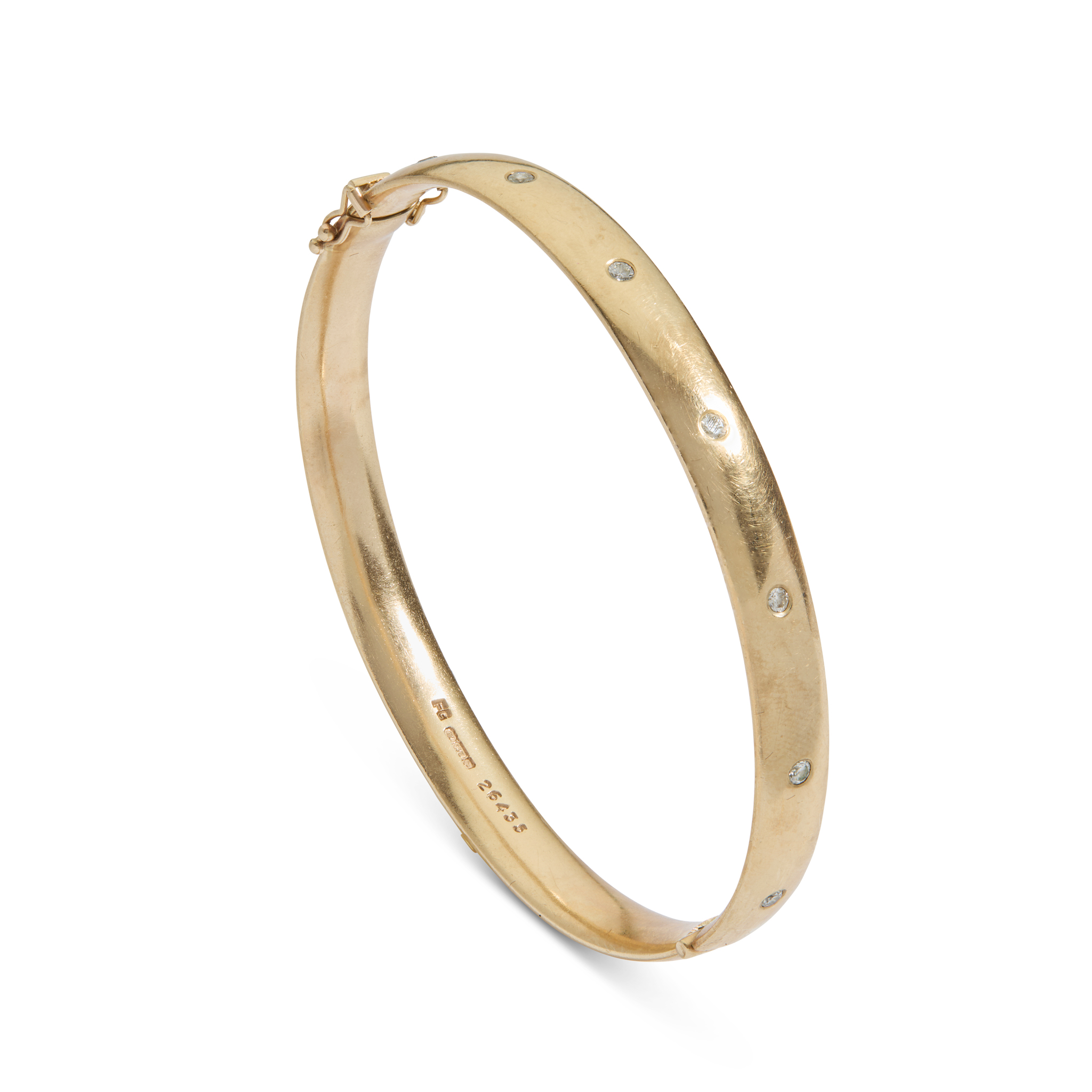 A 9ct gold diamond bangle