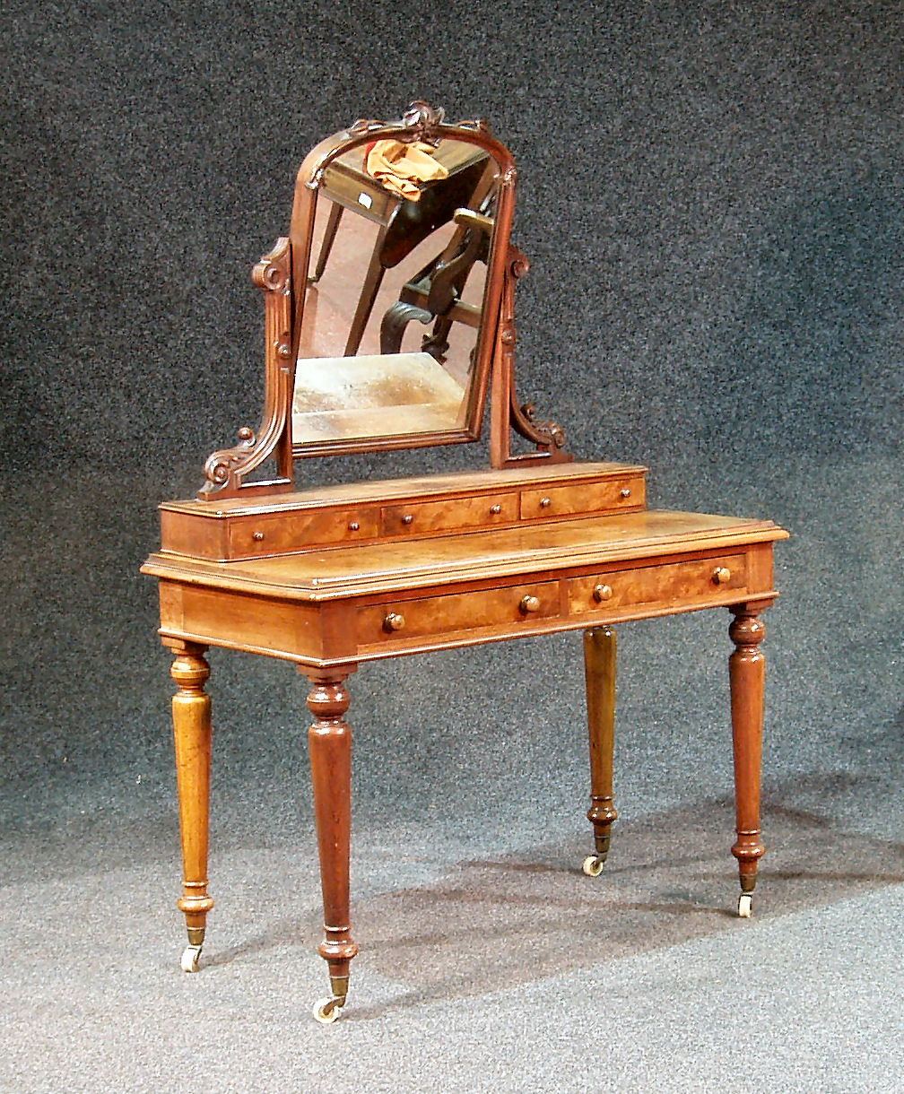 A Victorian walnut mirrored dressing table