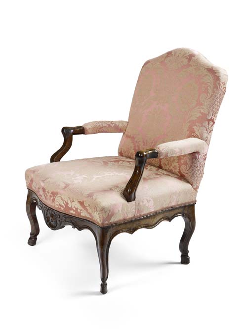 An 18th century French walnut framed fauteuil