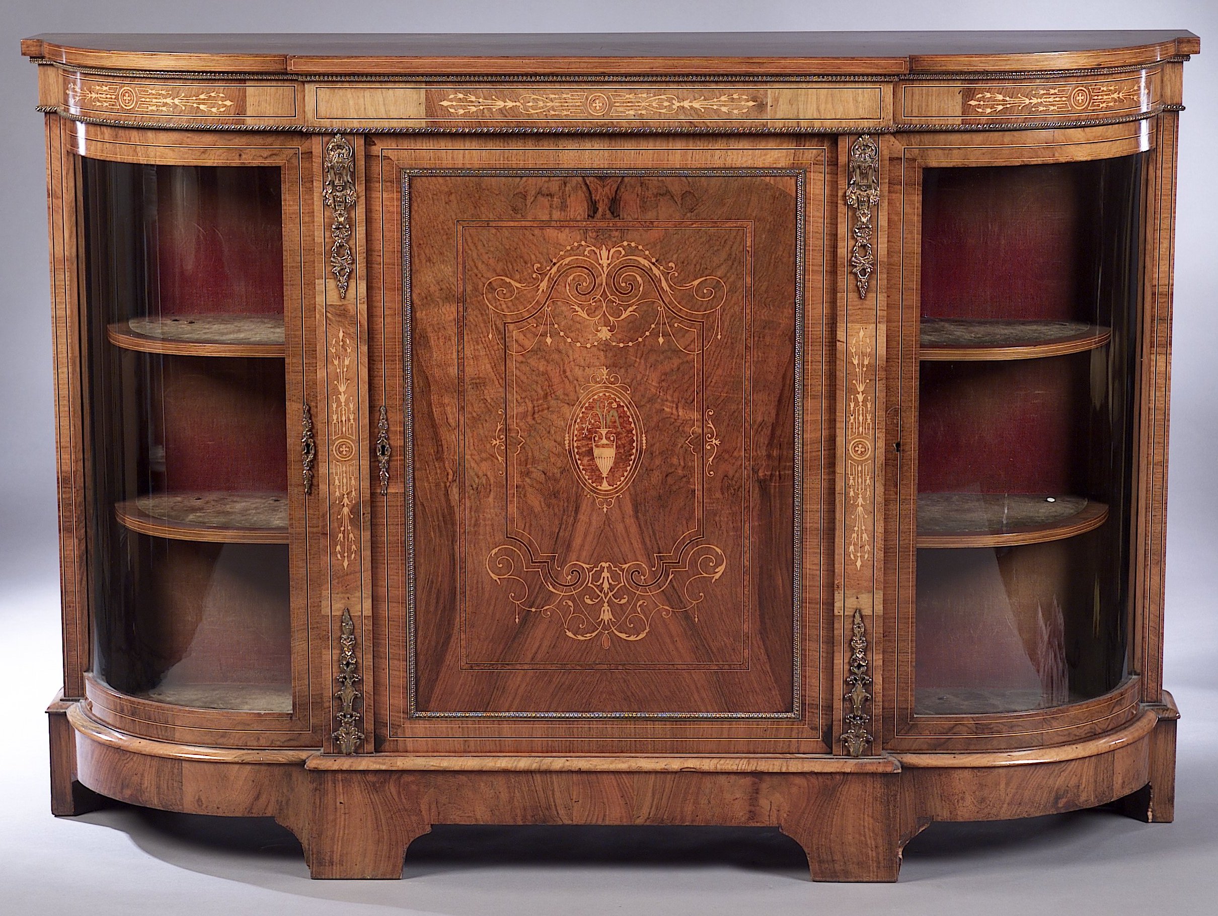 A Victorian walnut inlaid credenza