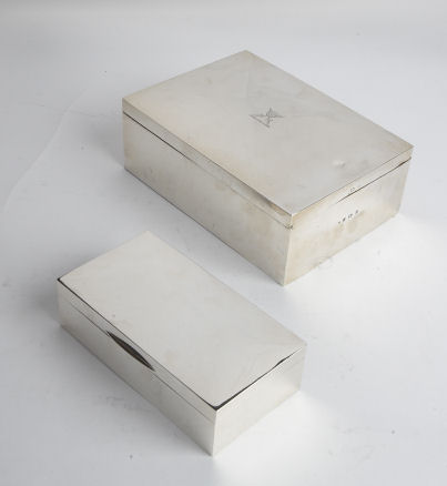A silver table cigarette box