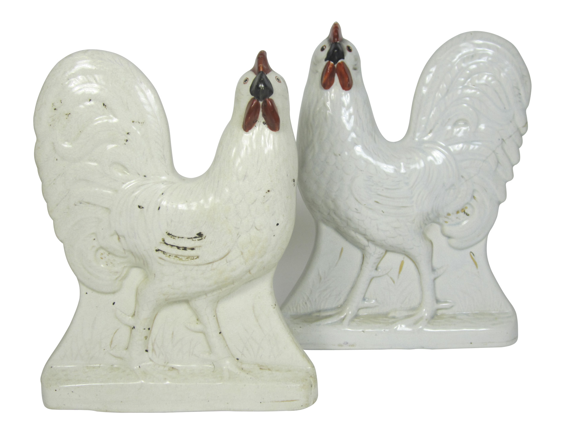 NEAR PAIR OF STAFFORDSHIRE POTTERY COCKERELS