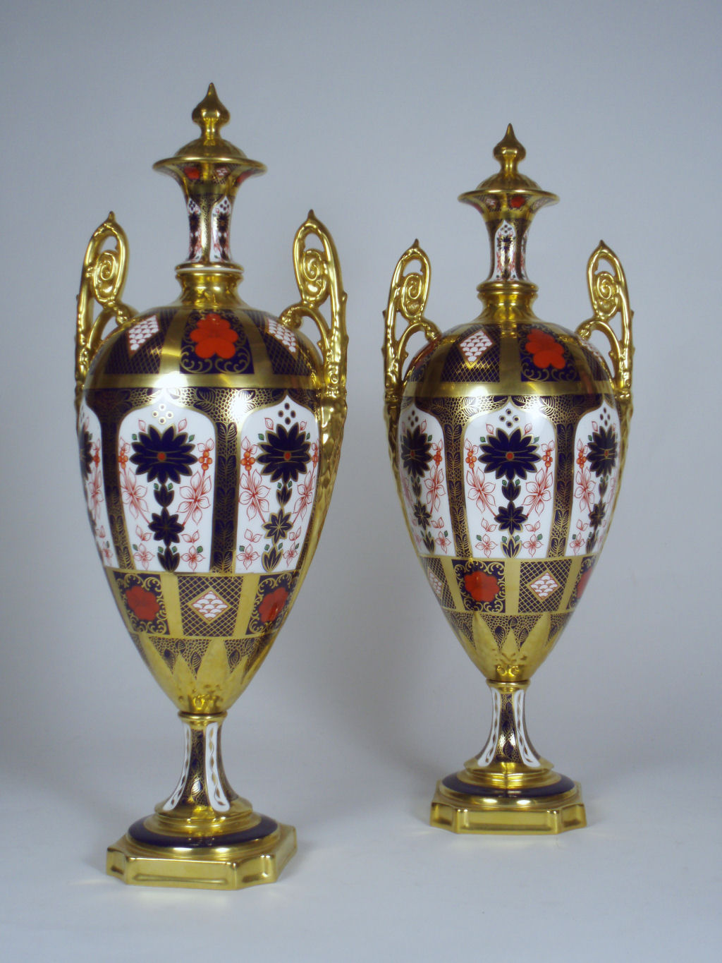 A pair of Royal Crown Derby ornamental urns