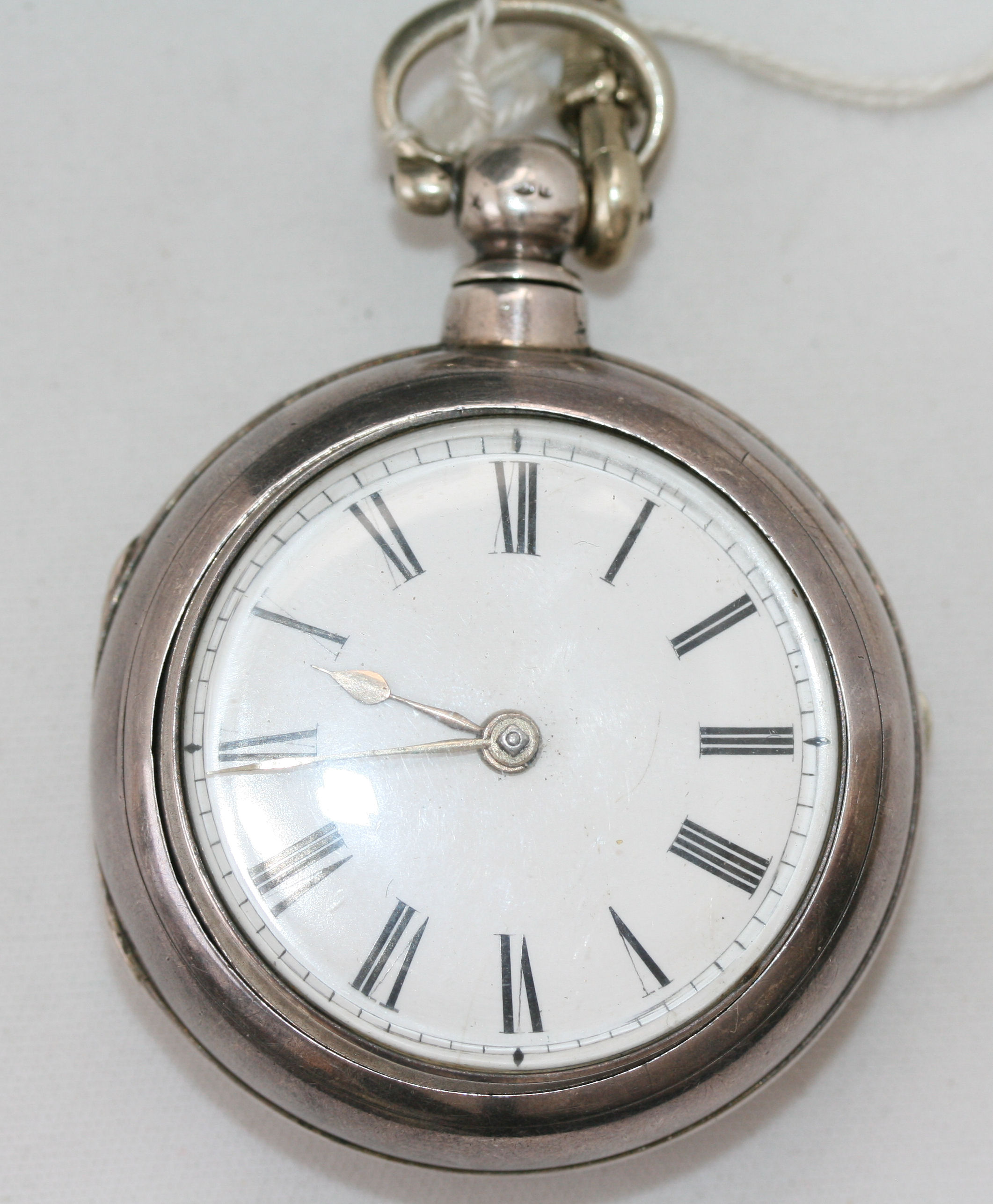 A George III silver pair cased pocket watch