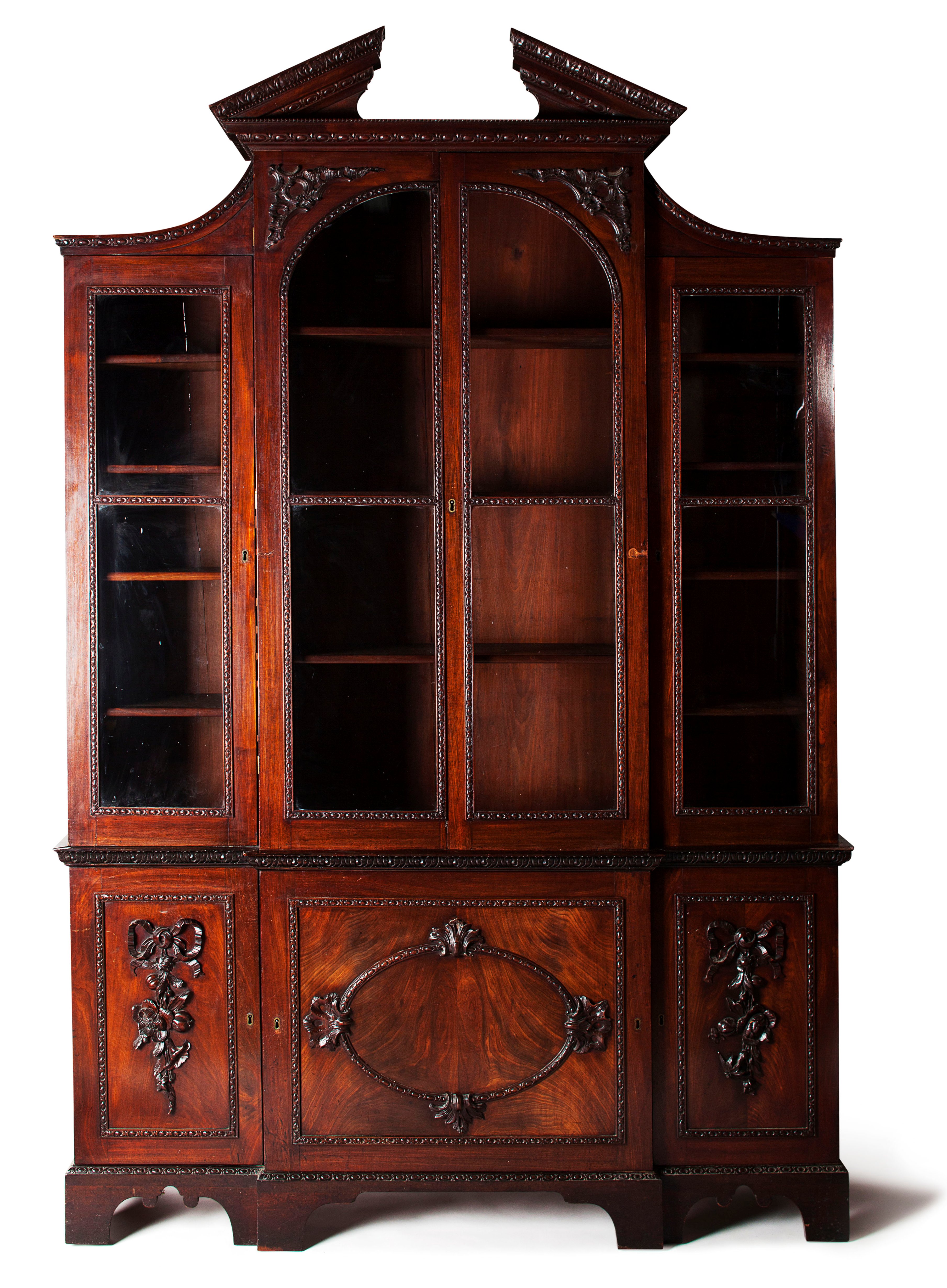 GOOD GEORGE II MAHOGANY BREAKFRONT BOOKCASE IN THE MANNER OF VILE AND COBB