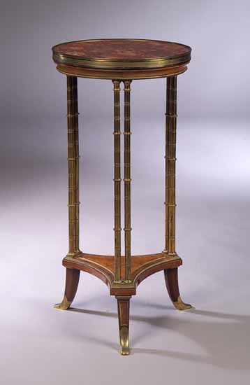 A 19th century French mahogany framed gueridon