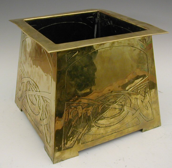 A Scottish Arts and Crafts brass jardiniere,