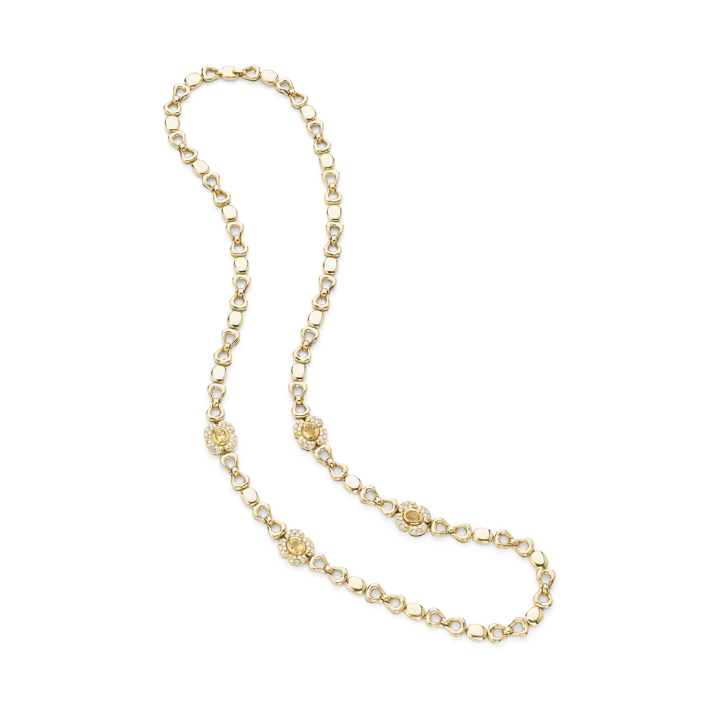 A long gold, diamond and citrine set necklace