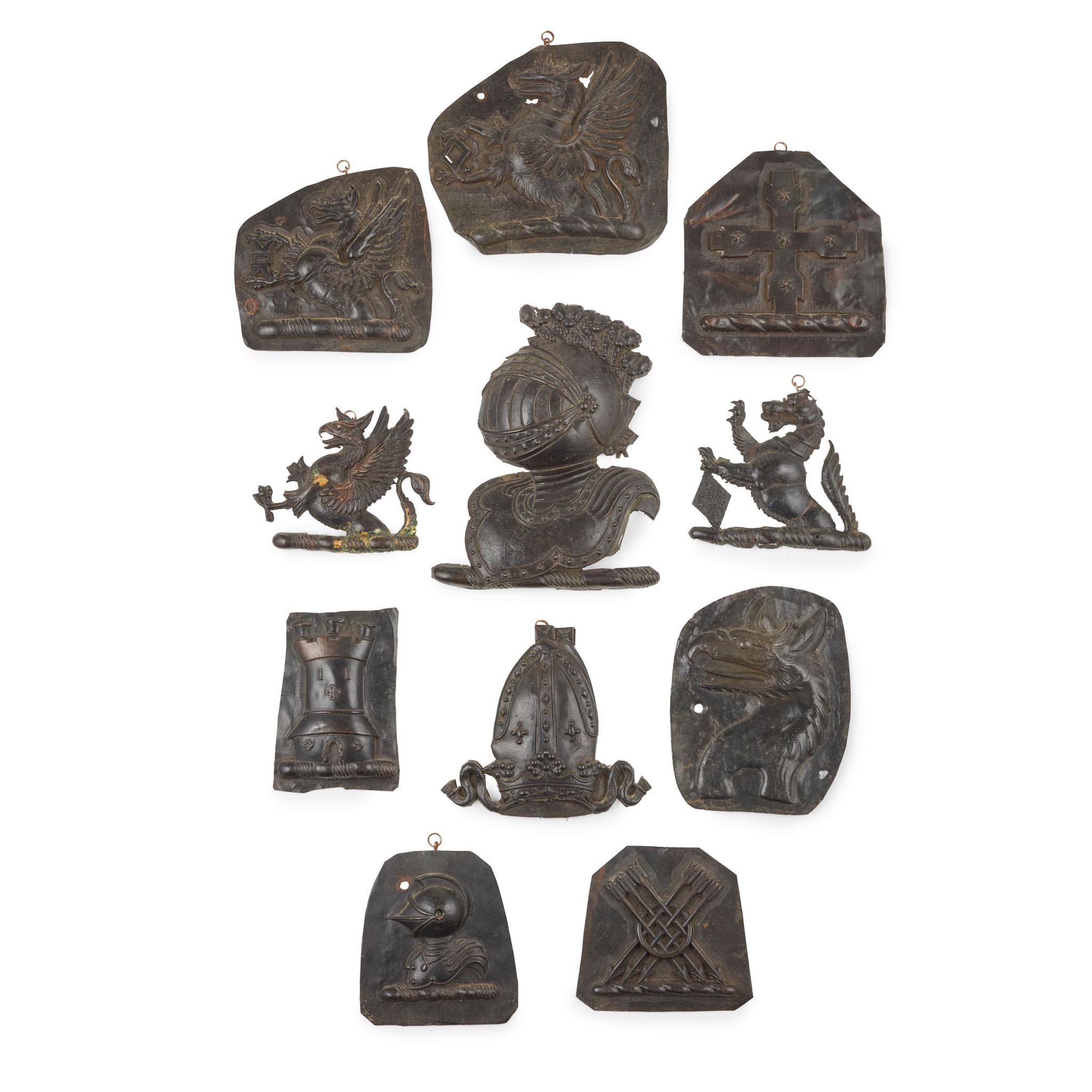 COLLECTION OF PATINATED SHEET METAL ARMORIAL APPLIQUÉS