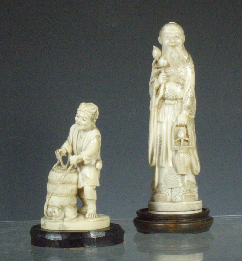 A 19th century Japanese ivory figure of a philosopher