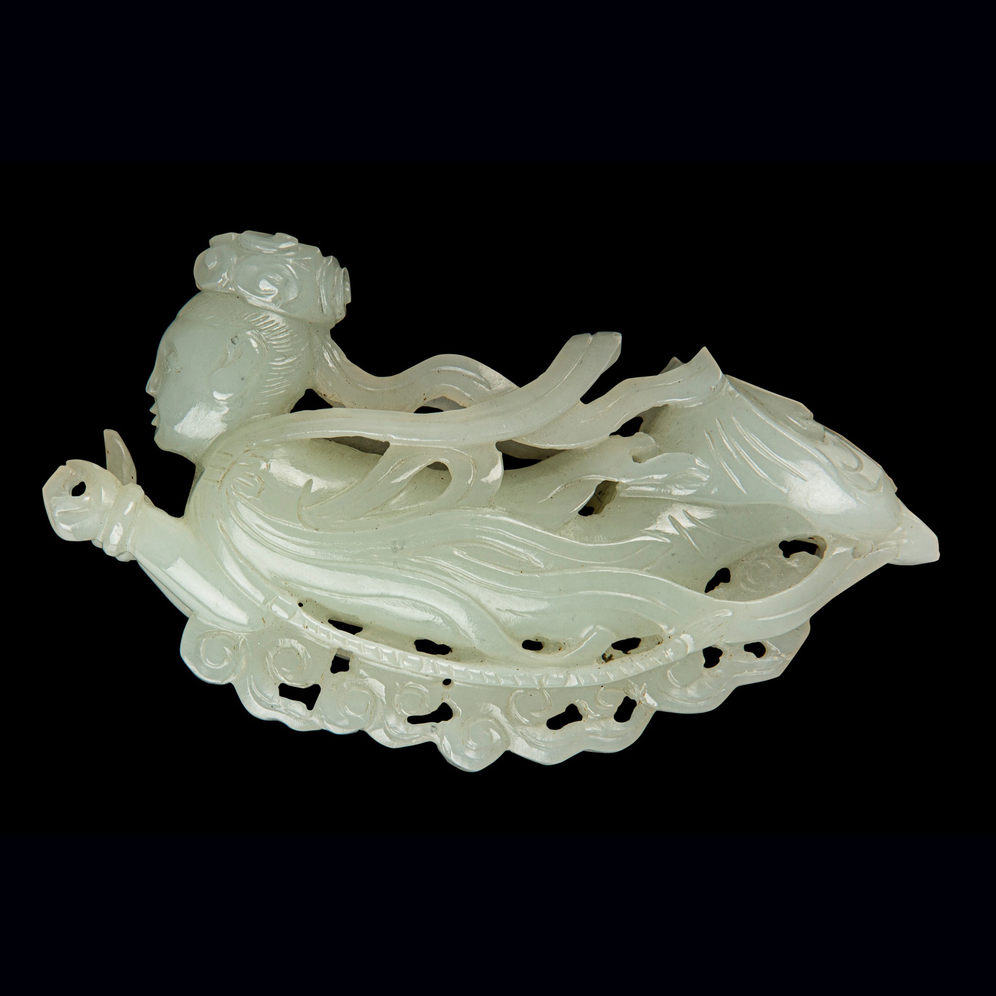 WHITE JADE CARVING OF AN APSARA