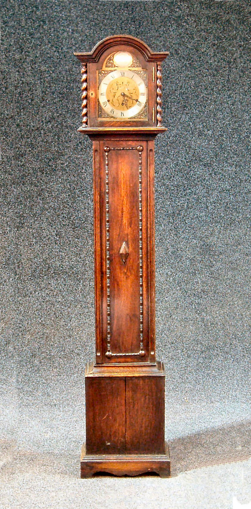 An oak 8-day Grandmother clock,