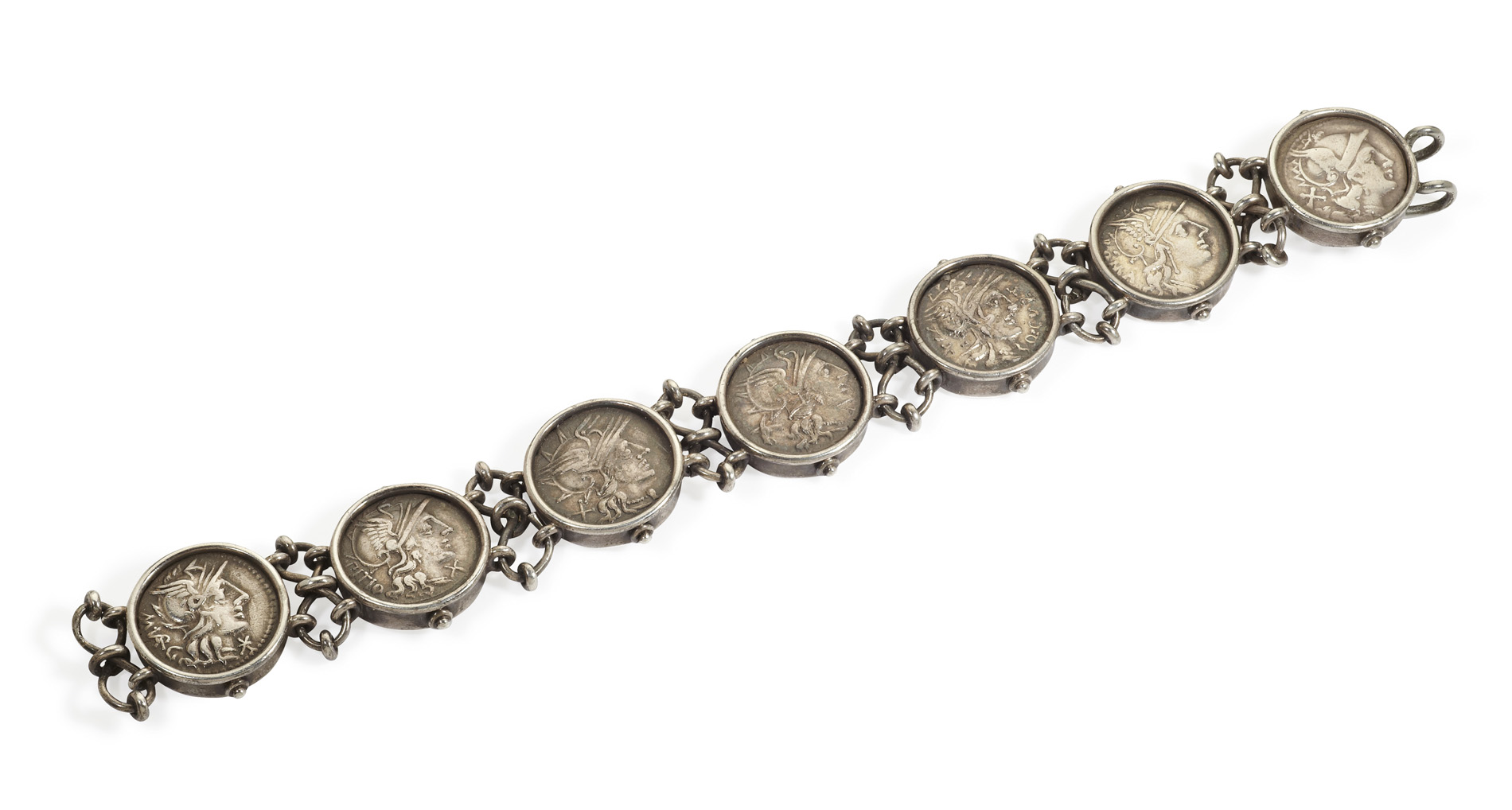 A silver bracelet set coins