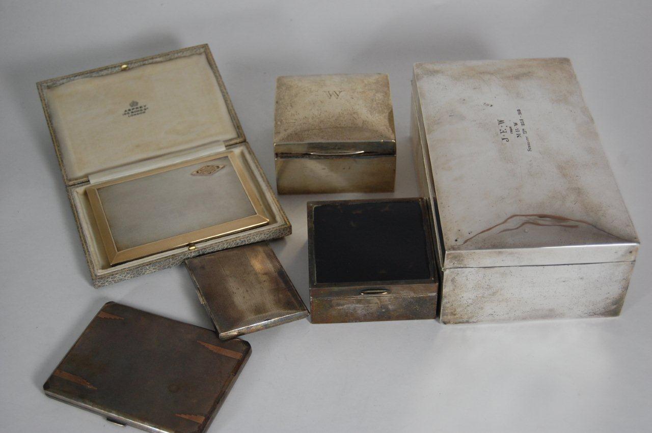 A group of cigarette boxes and cases