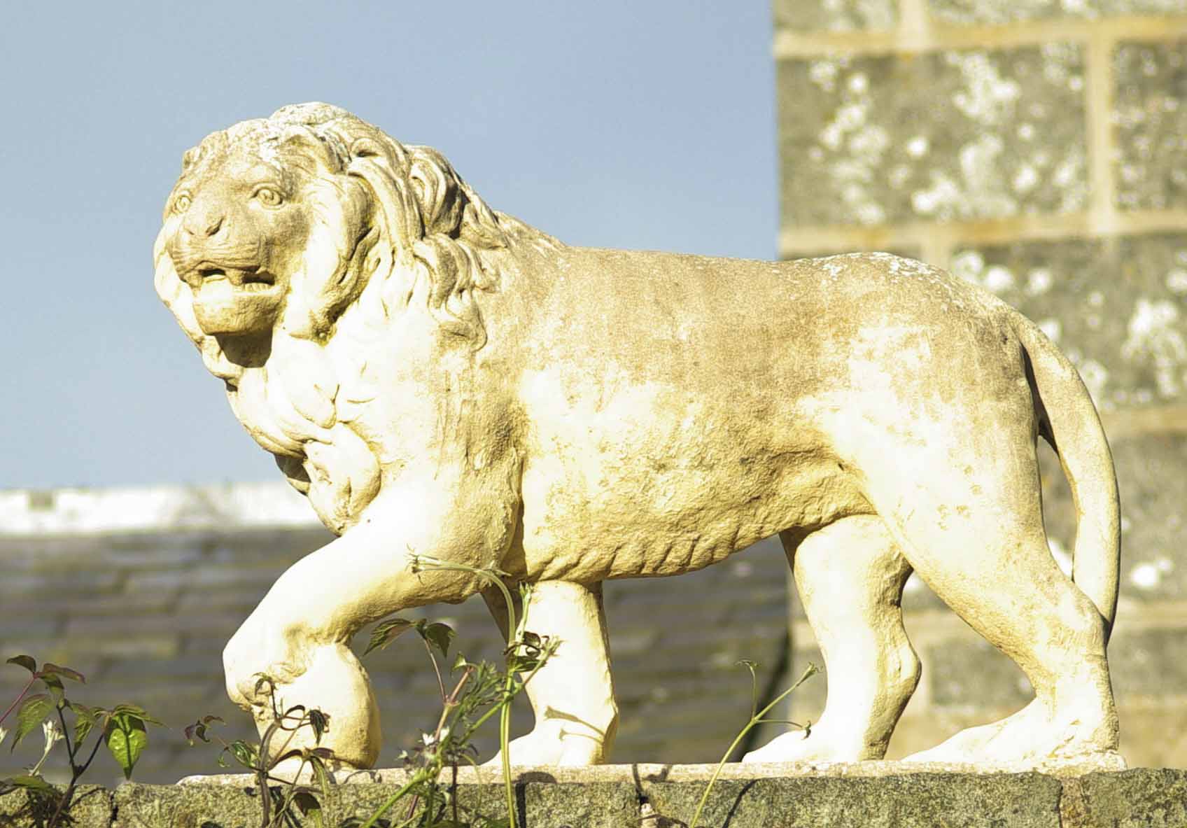 PAIR OF COMPOSITION STONE FIGURES OF THE MEDICI LIONS
