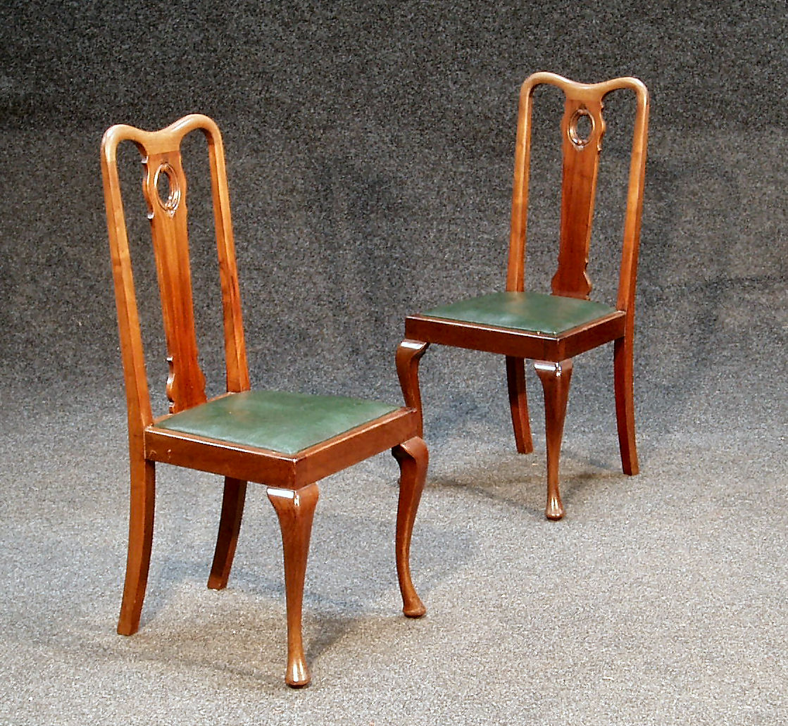 A set of George II style mahogany dining chairs,