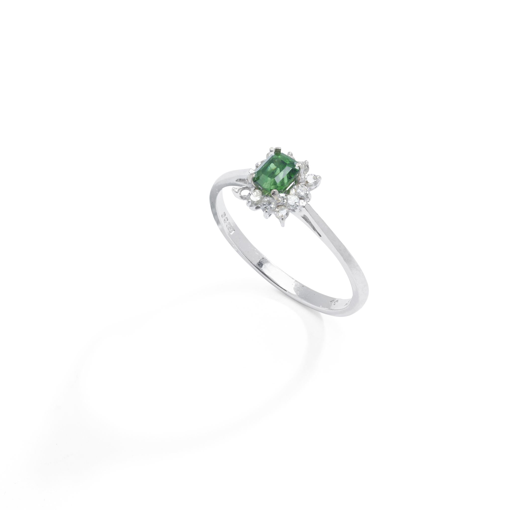 A demantoid garnet and diamond cluster ring, 1978