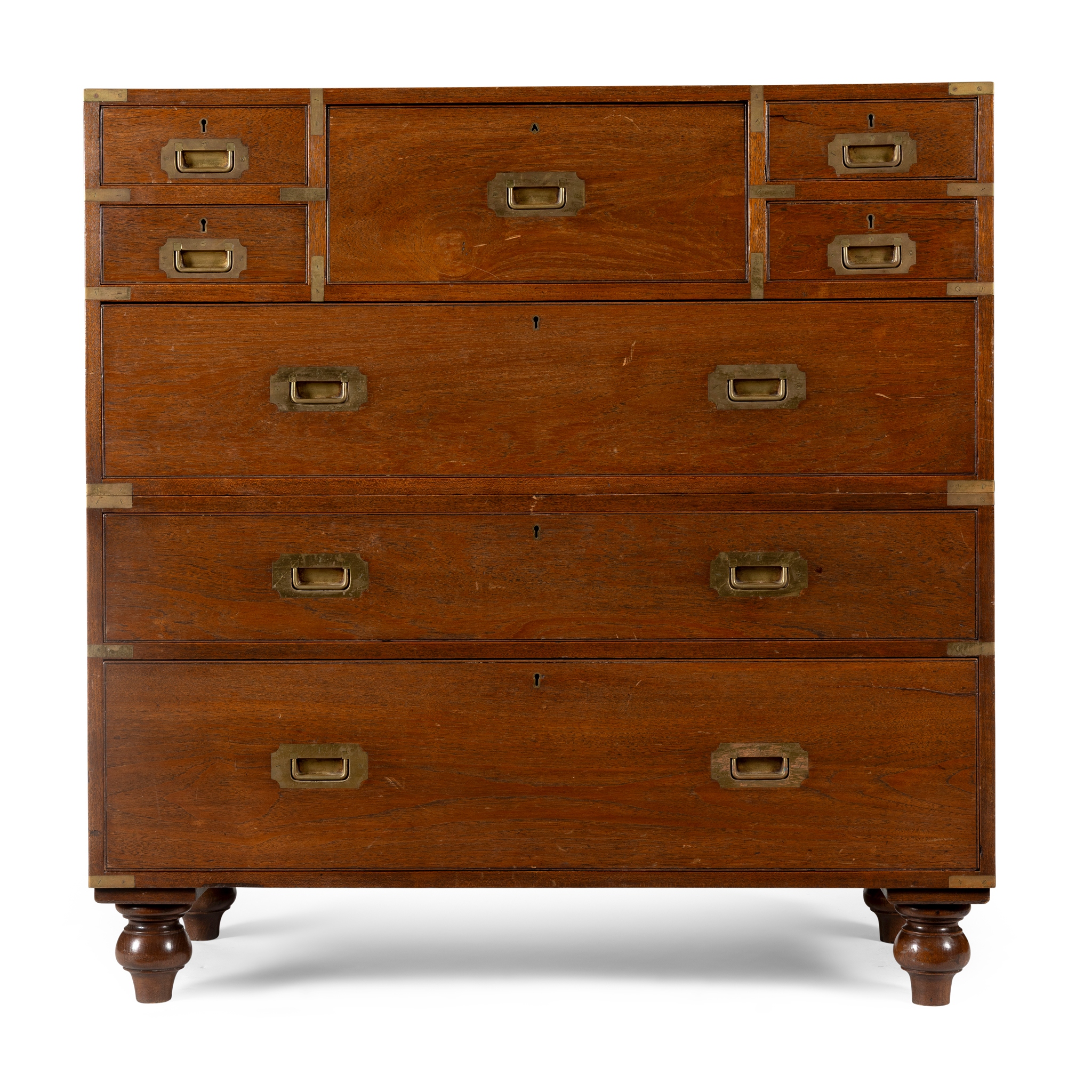 THREE ARMY & NAVY TEAK AND BRASS BOUND CAMPAIGN CHEST OF DRAWERS