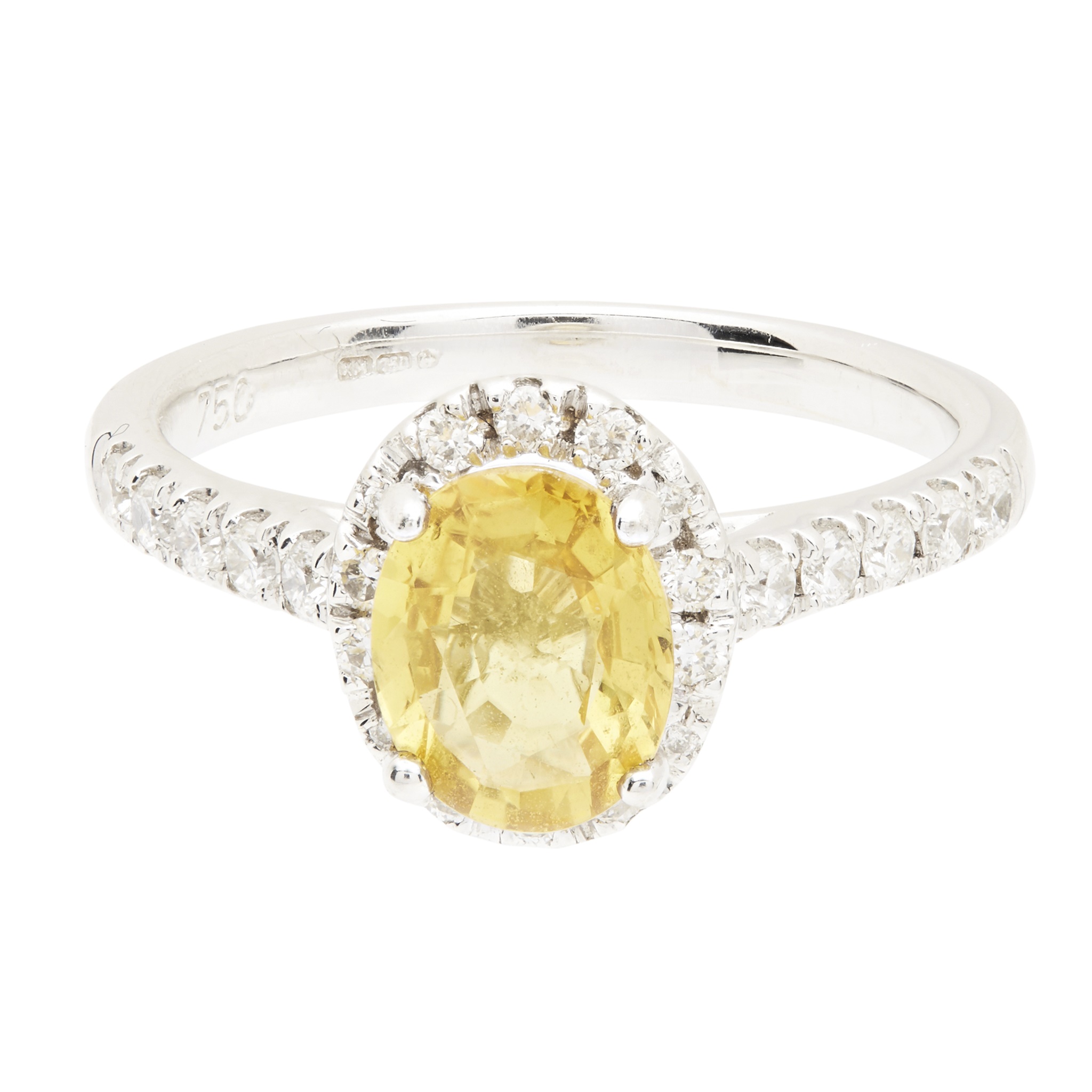 An 18ct gold yellow sapphire and diamond ring