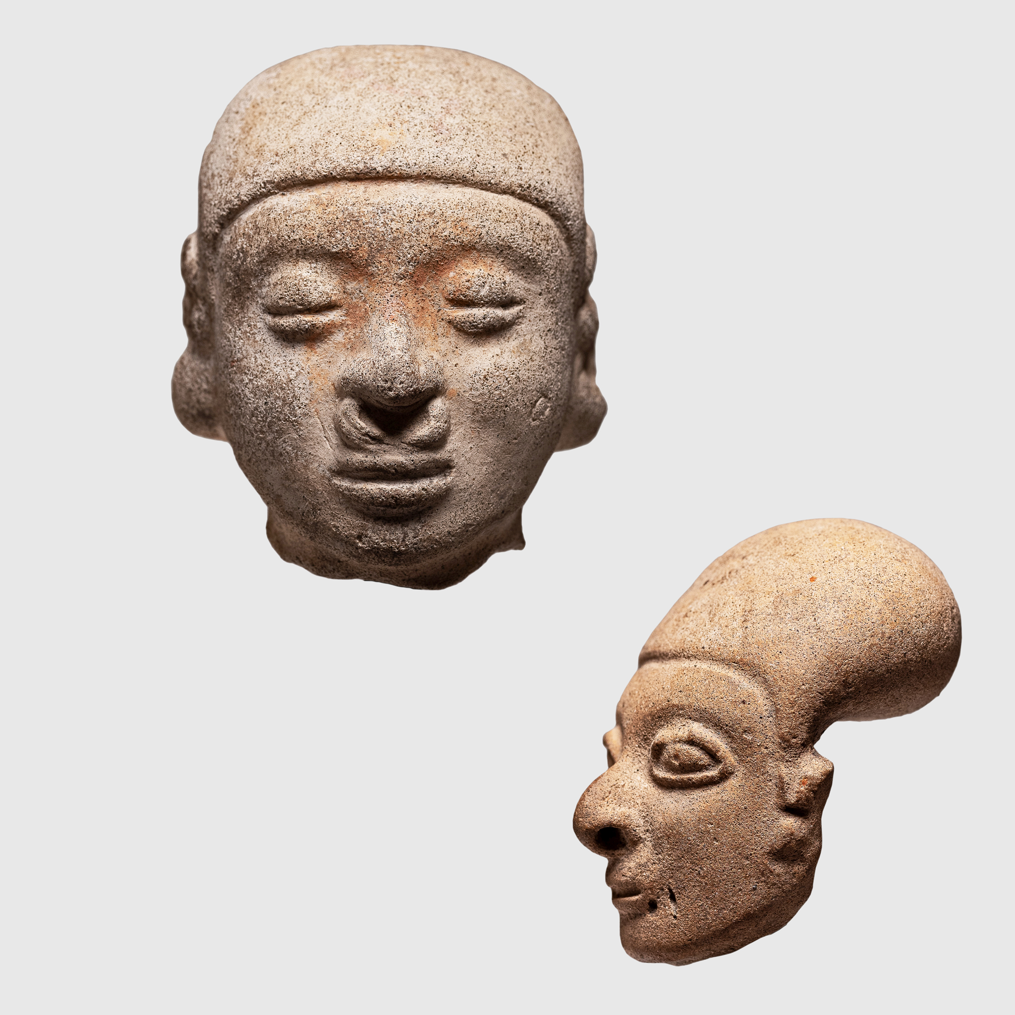 PAIR OF TUMACO HEADS