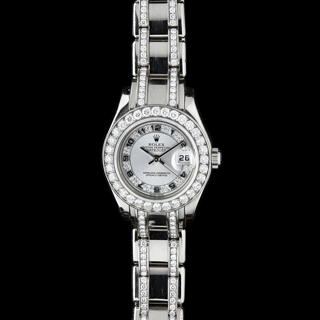 ROLEX - A lady's 18k white gold and diamond set wrist watch